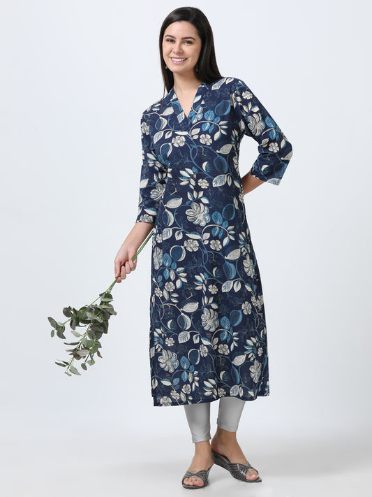 Model wearing Navy Blue Floral V-Neck Kurti, featuring a delicate floral print and flattering v-neck design.