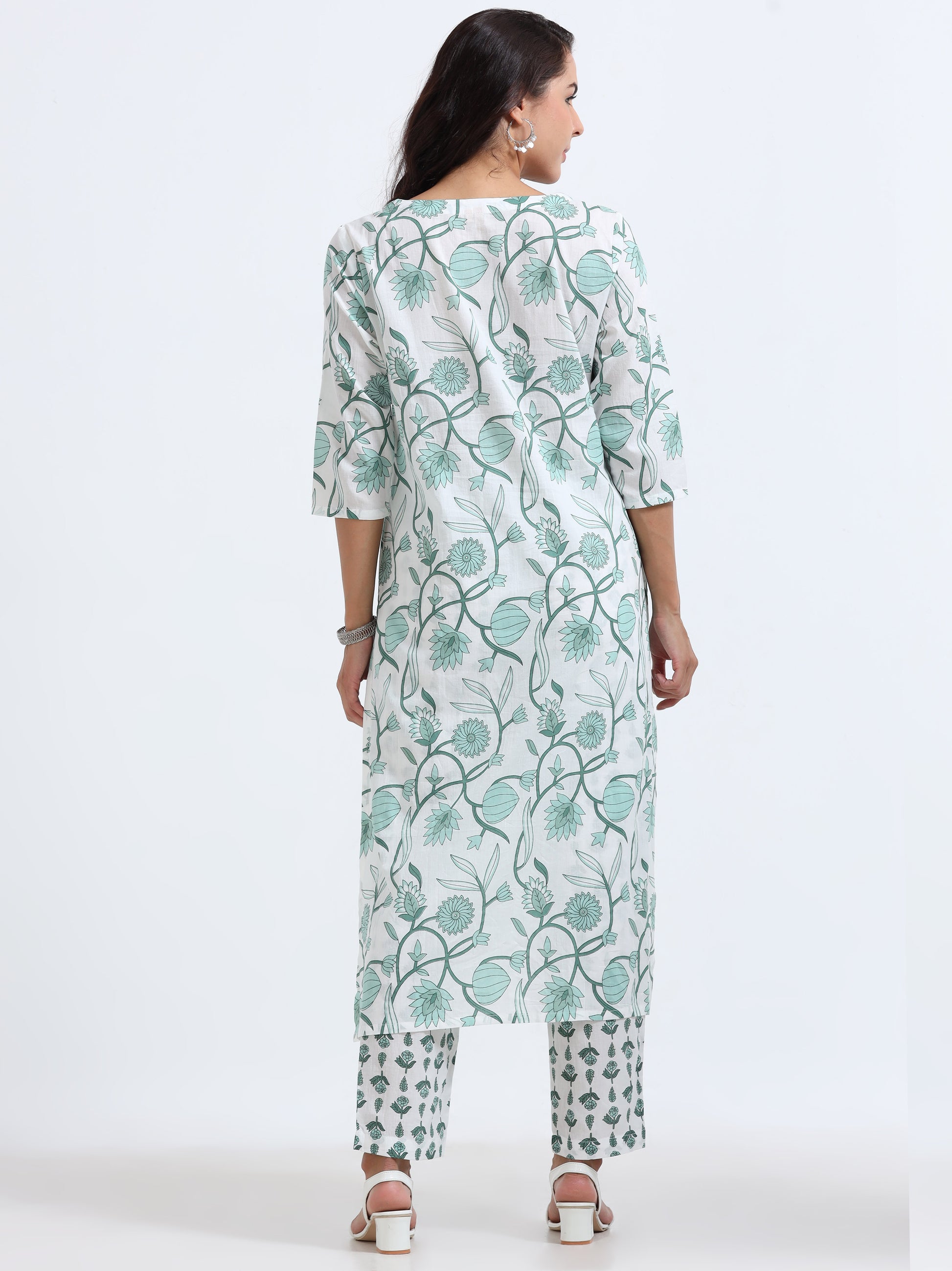 Cyan Floral Kurti Set paired with matching pants, blending traditional charm with contemporary elegance.