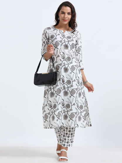 Model wearing Grey Floral Elegance Kurti Set, showcasing a sophisticated blend of floral patterns and soft grey fabric