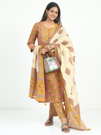 Model wearing Mustard Floral Kurti with a vibrant floral print, perfect for both casual and festive occasions.