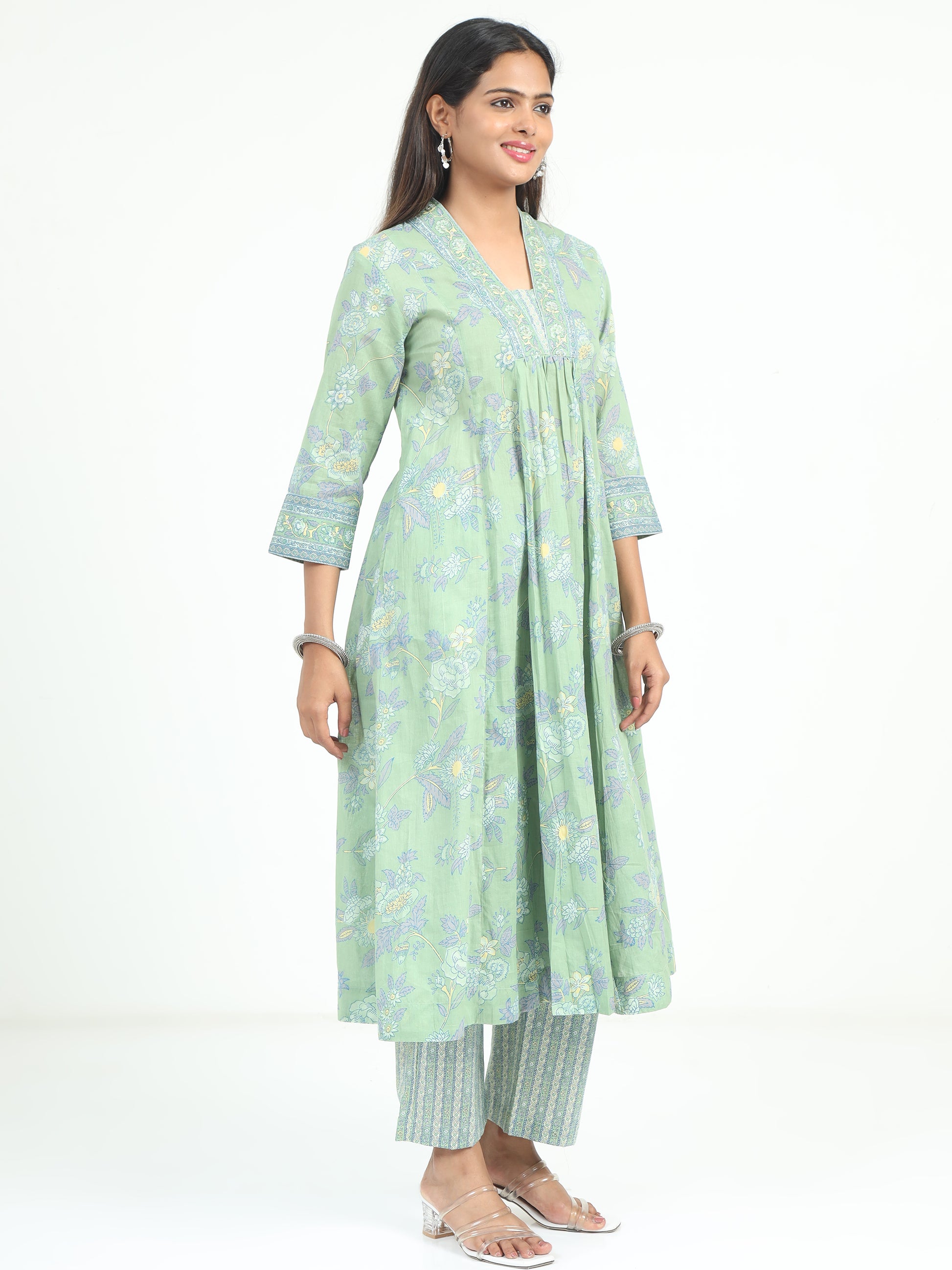 Side view of the Teal Floral Kurti, highlighting its comfortable fit and beautiful, bold floral design.