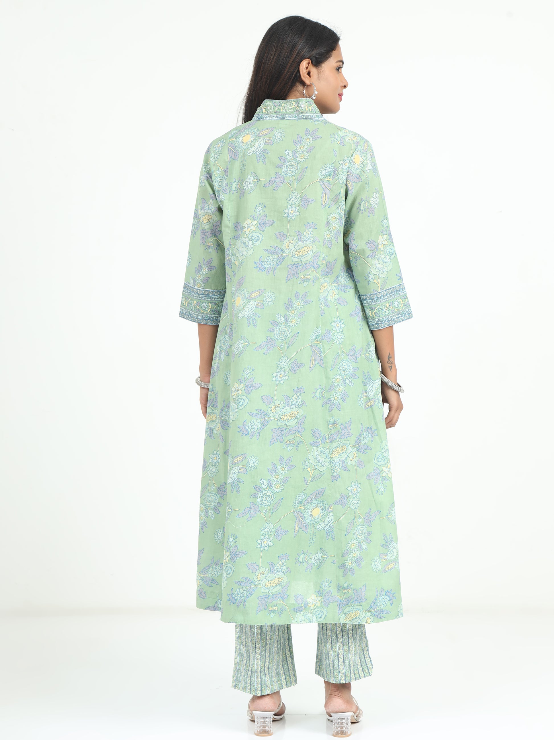 Teal Floral Kurti displayed with matching accessories, bringing a chic and traditional look to any wardrobe.