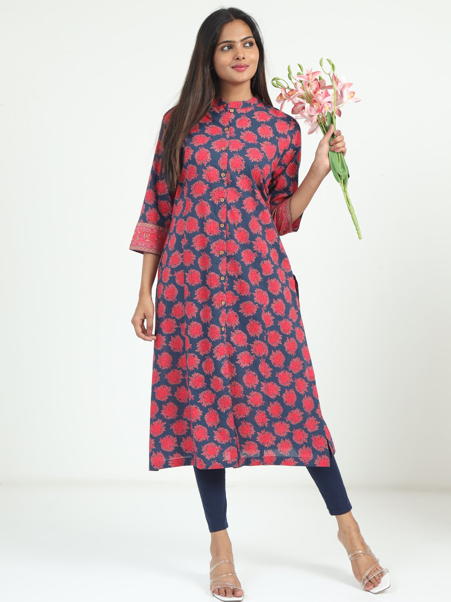 The Blue & Pink Floral Kurti displayed with accessories, offering a versatile and stylish option for any occasion.