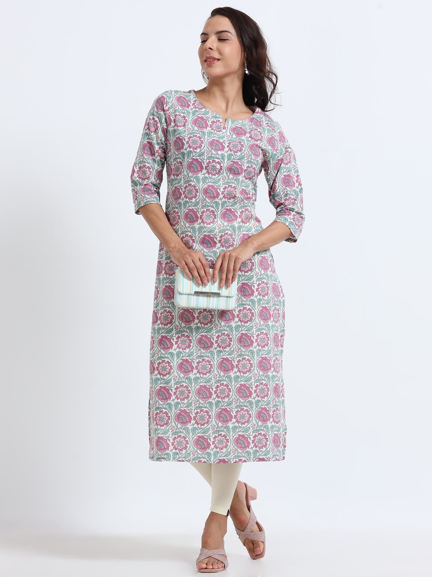 Model wearing the Blue Blush Floral Kurti, highlighting the intricate floral pattern that adds a whimsical touch to the outfit.