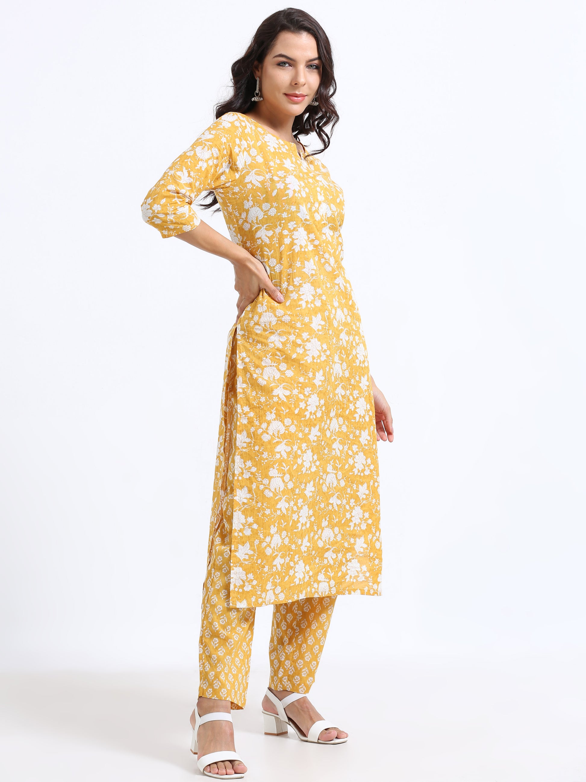 The Sunshine Serenity Floral Kurti Set displayed with a serene background, emphasizing the bright, cheerful colors and delicate floral print.