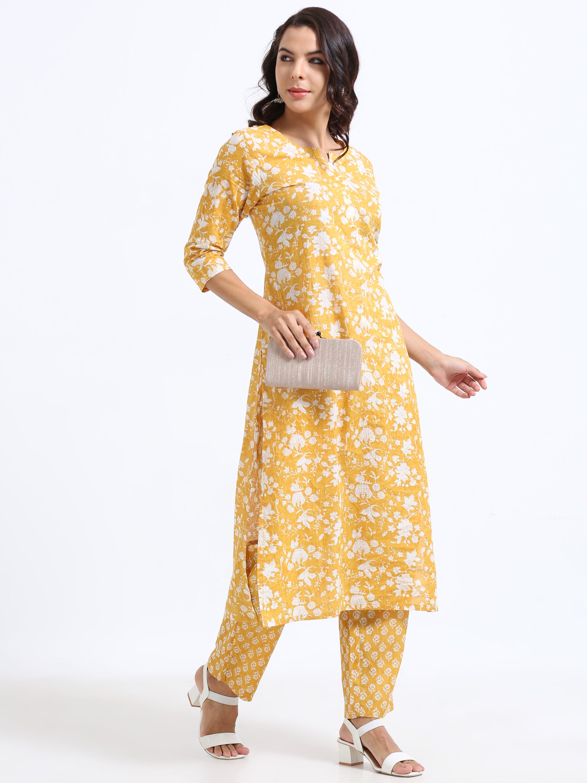 Model wearing Sunshine Serenity Floral Kurti Set, featuring a blend of sunny yellow and crisp white with a charming floral print.