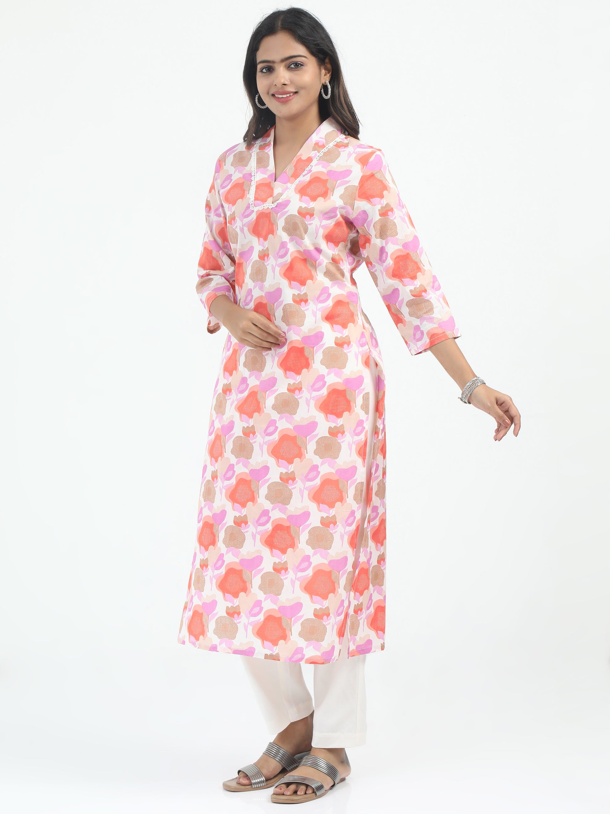 Close-up of the multi-colored floral design on the Pastel Shade Cotton Kurti Set, highlighting the playful yet elegant pattern.