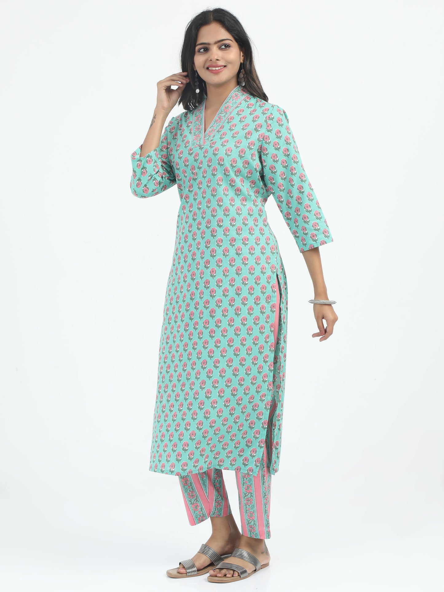 Close-up of the floral print on the Premium Cotton Floral Printed Kurti Set, showcasing the rich green and pink hues on soft cotton fabric.