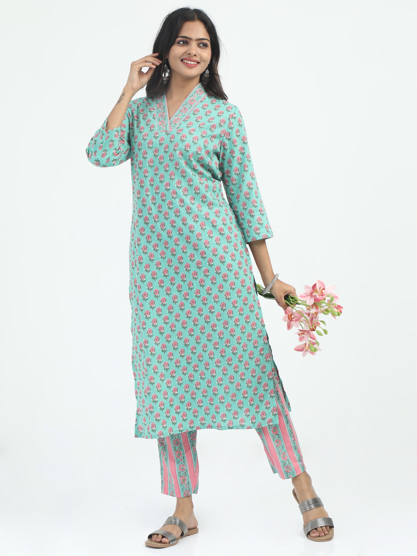 The Premium Cotton Floral Printed Kurti Set displayed with accessories, offering a perfect blend of style, comfort, and vibrant colors.